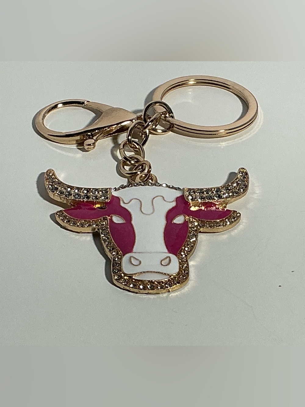 Gold Bull Head Keychain with Pink and White Enamel
